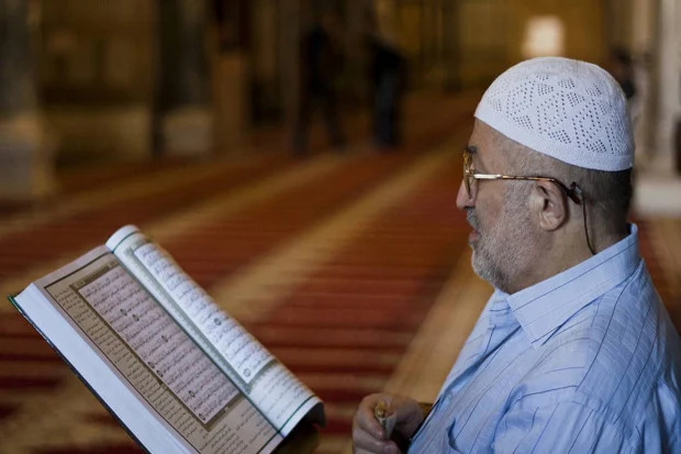 tajwid at taubah ayat 105